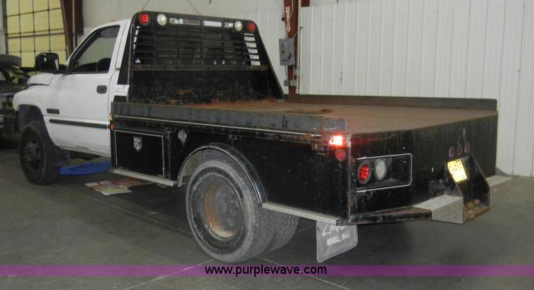 image for item D4041 2001 Dodge Ram 3500 Laramie SLT flatbed truck