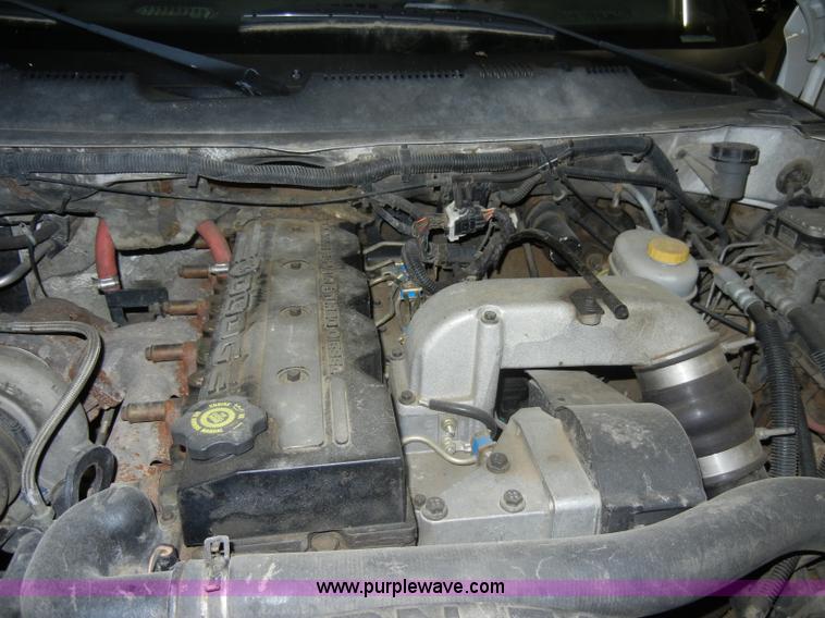 image for item D4041 2001 Dodge Ram 3500 Laramie SLT flatbed truck