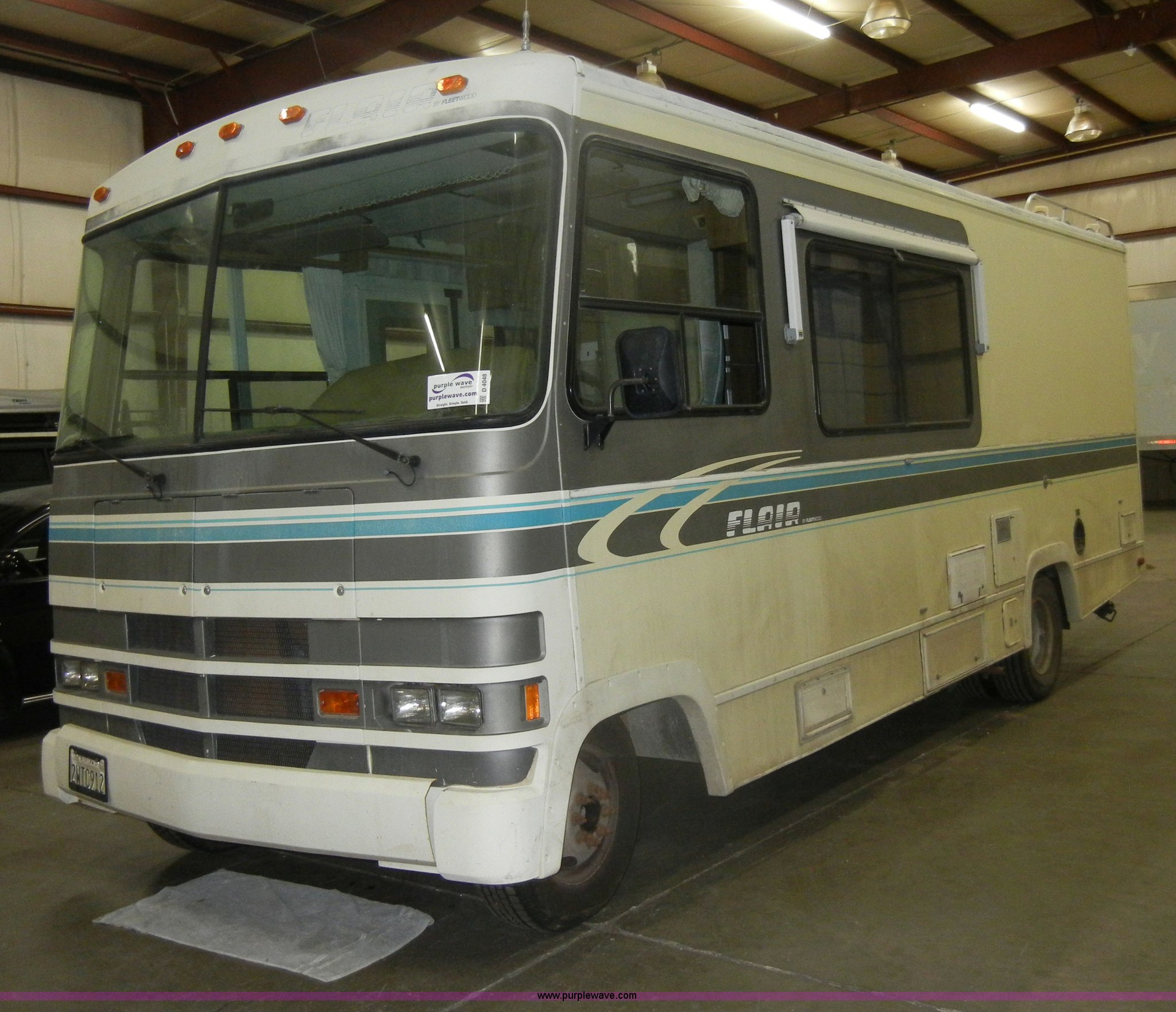 1991 Ford Flair Fleetwood RV in Topeka, KS Item D4048 sold Purple Wave