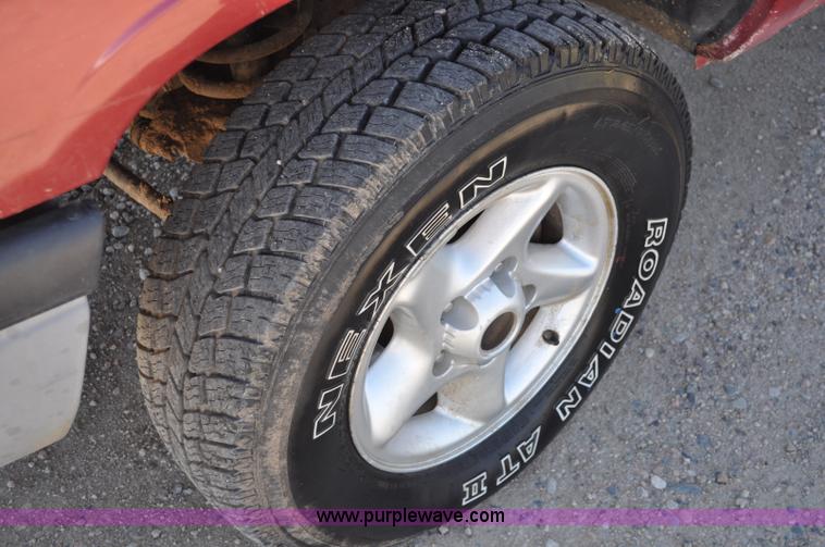 image for item A5888 1999 Dodge Ram 1500 quad cab pickup truck