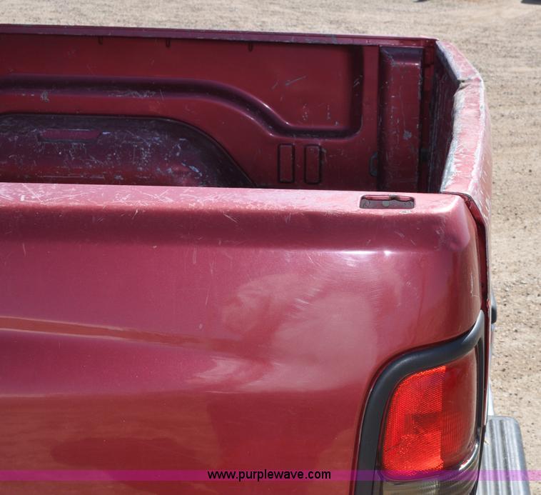 image for item A5888 1999 Dodge Ram 1500 quad cab pickup truck