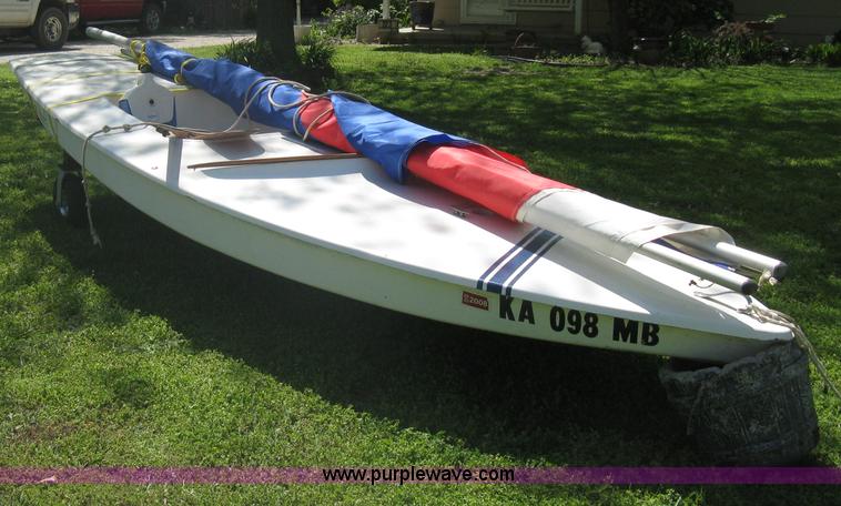 image for item A6319 1976 Sunfish 14' two person sailboat