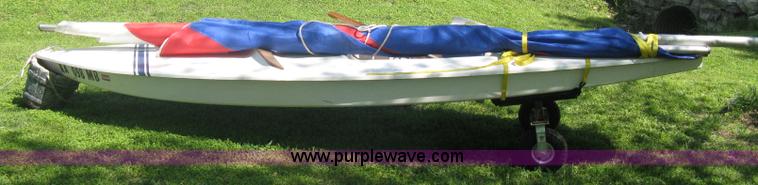 image for item A6319 1976 Sunfish 14' two person sailboat