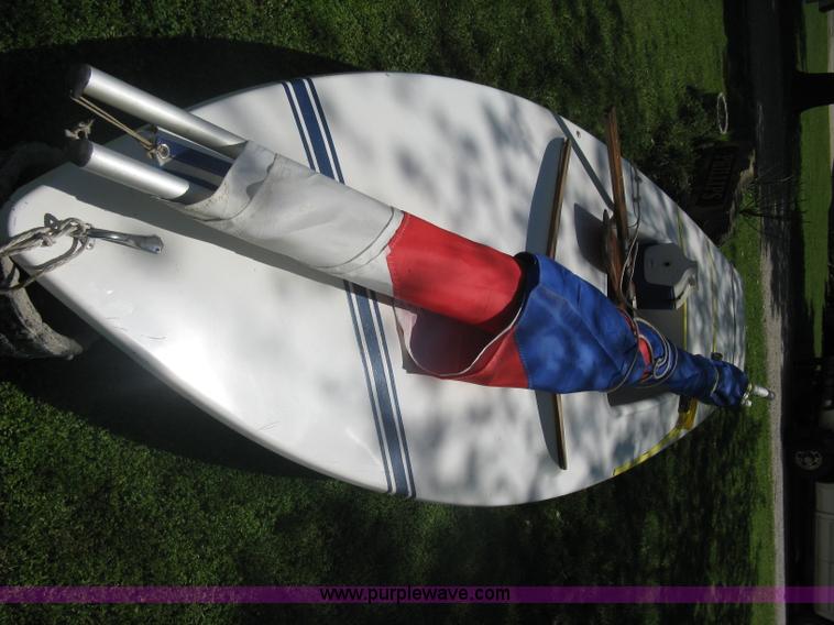 image for item A6319 1976 Sunfish 14' two person sailboat
