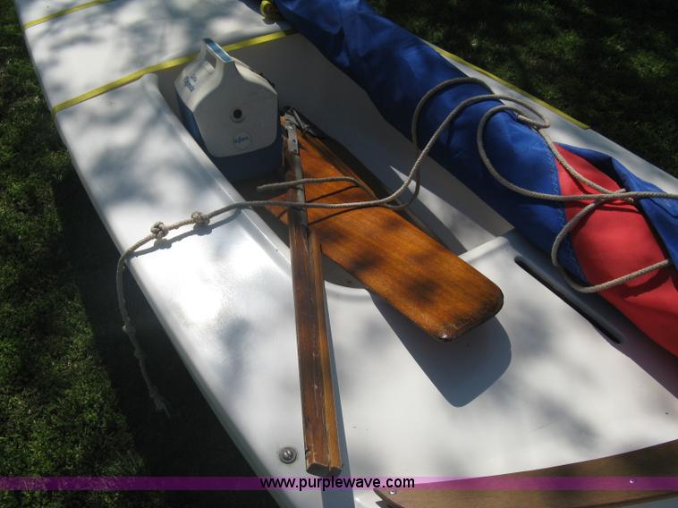 image for item A6319 1976 Sunfish 14' two person sailboat