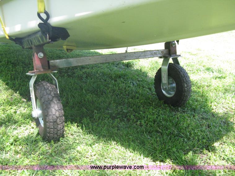 image for item A6319 1976 Sunfish 14' two person sailboat