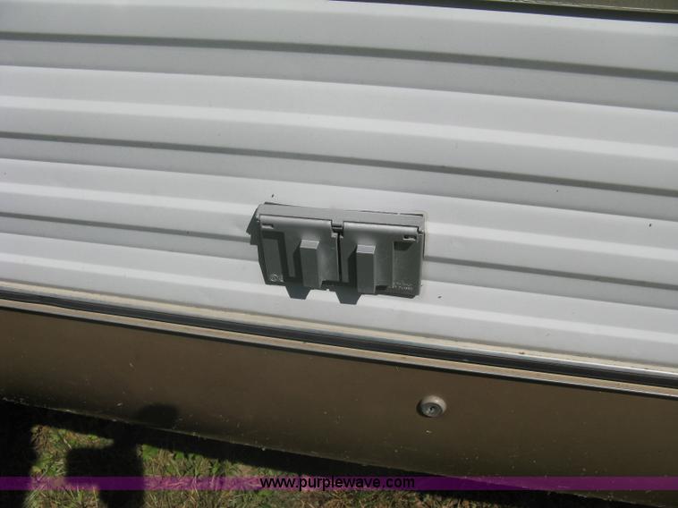image for item A6320 1985 Kountry Aire 32' fifth wheel camper