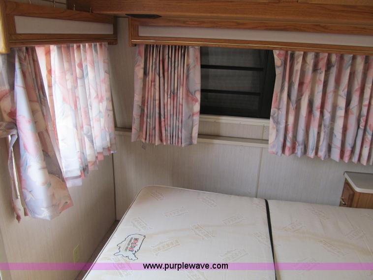 image for item A8300 1989 Holiday Rambler Imperial 31' tandem axle camper