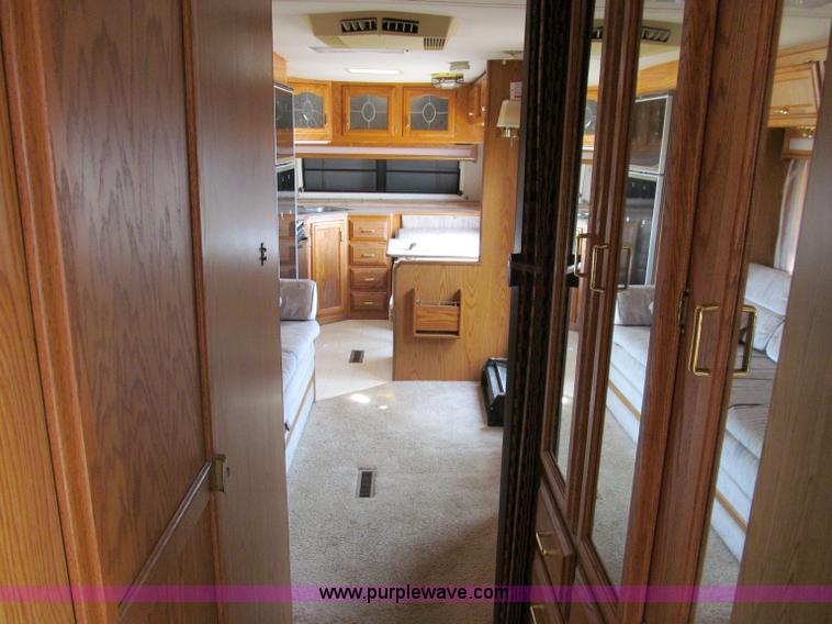 image for item A8300 1989 Holiday Rambler Imperial 31' tandem axle camper