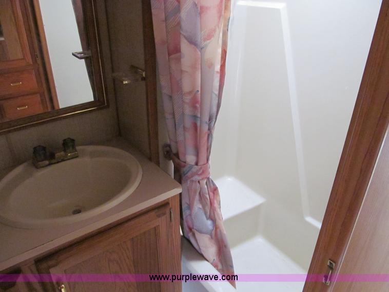 image for item A8300 1989 Holiday Rambler Imperial 31' tandem axle camper