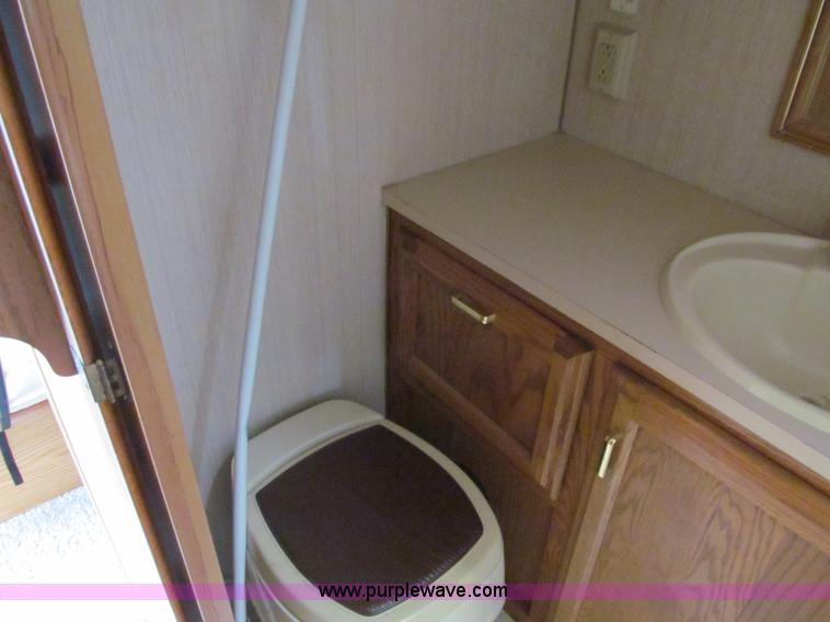 image for item A8300 1989 Holiday Rambler Imperial 31' tandem axle camper