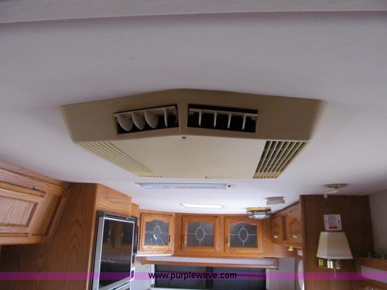 image for item A8300 1989 Holiday Rambler Imperial 31' tandem axle camper