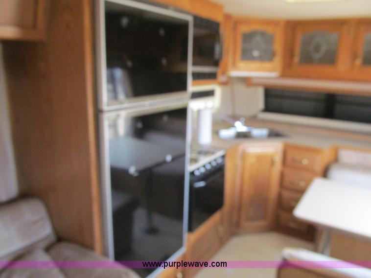 image for item A8300 1989 Holiday Rambler Imperial 31' tandem axle camper