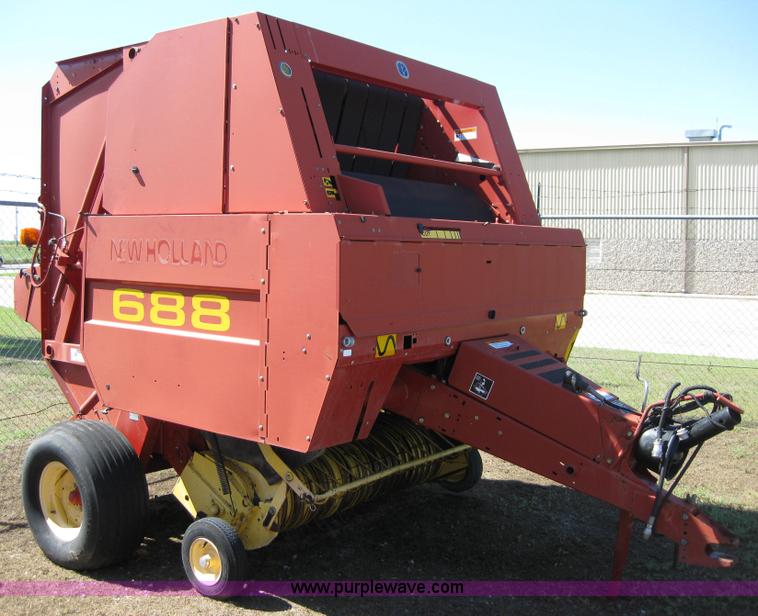 image for item B1216 2002 New Holland 688 round baler