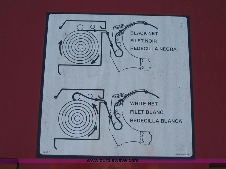 image for item B1216 2002 New Holland 688 round baler