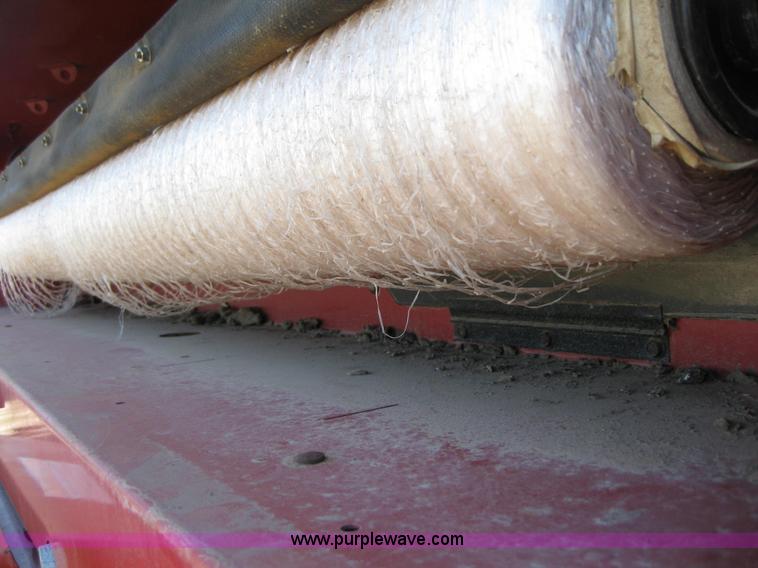 image for item B1216 2002 New Holland 688 round baler