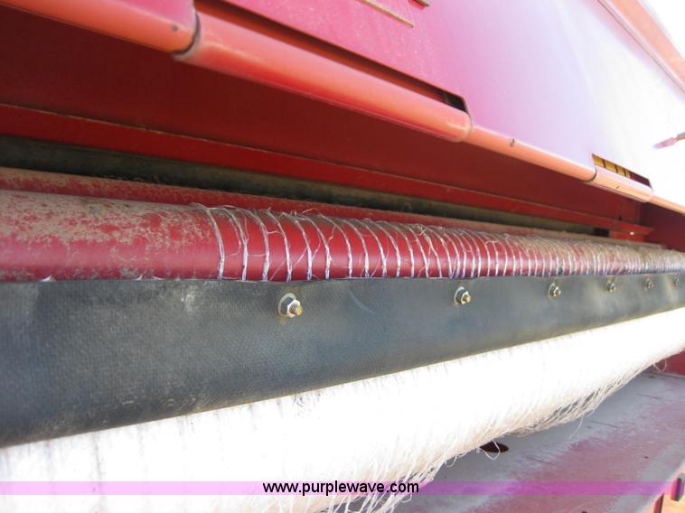 image for item B1216 2002 New Holland 688 round baler