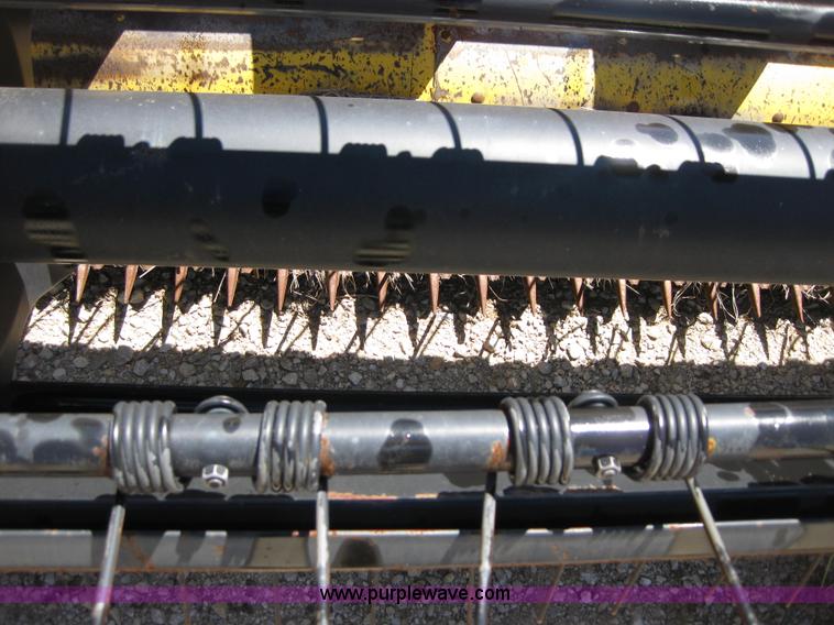image for item B1225 1996 New Holland 1475 swather