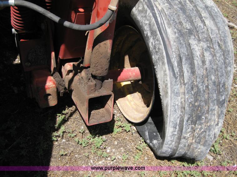 image for item B1225 1996 New Holland 1475 swather