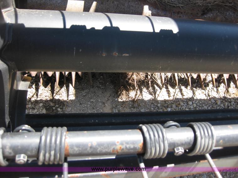 image for item B1225 1996 New Holland 1475 swather