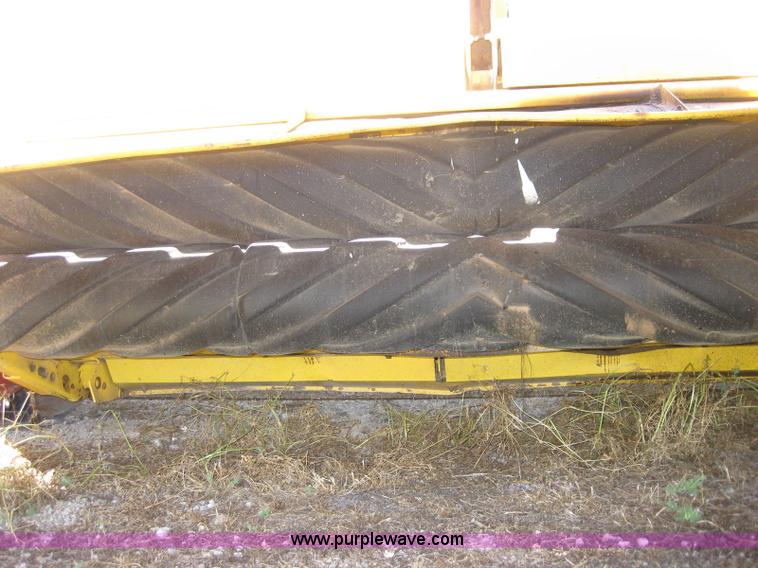 image for item B1225 1996 New Holland 1475 swather