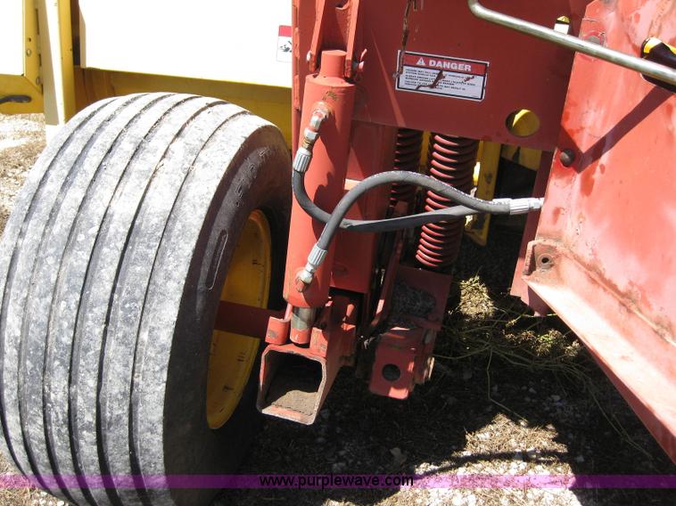 image for item B1225 1996 New Holland 1475 swather