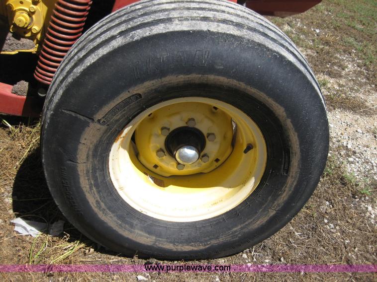 image for item B1225 1996 New Holland 1475 swather