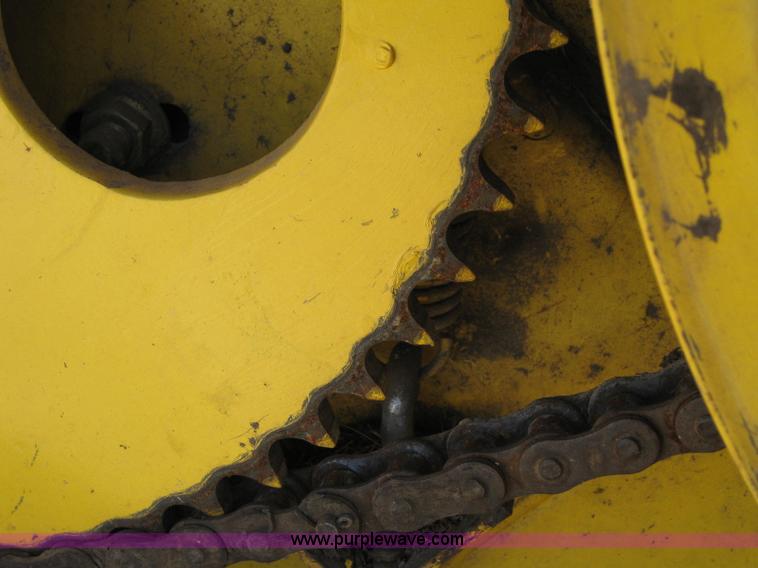 image for item B1225 1996 New Holland 1475 swather