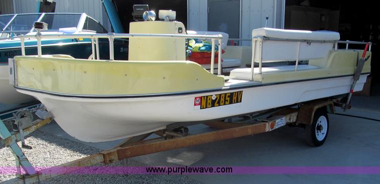 image for item B5131 1972 Anchor Plastics 614DVG 15 1/2' deck boat with Golden Rod trailer