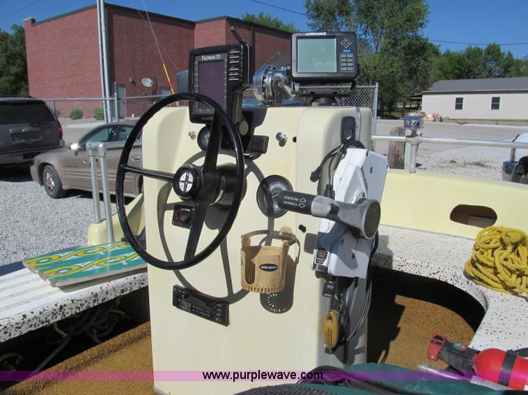 image for item B5131 1972 Anchor Plastics 614DVG 15 1/2' deck boat with Golden Rod trailer