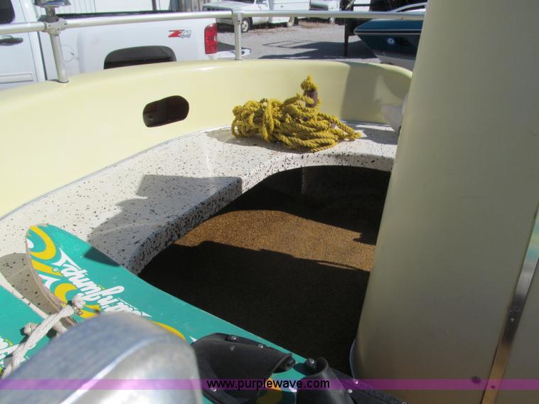 image for item B5131 1972 Anchor Plastics 614DVG 15 1/2' deck boat with Golden Rod trailer