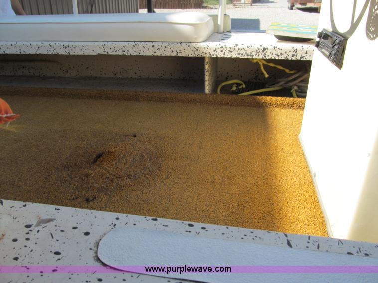 image for item B5131 1972 Anchor Plastics 614DVG 15 1/2' deck boat with Golden Rod trailer