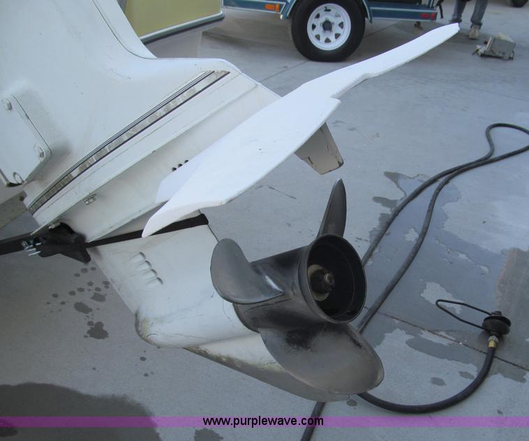 image for item B5131 1972 Anchor Plastics 614DVG 15 1/2' deck boat with Golden Rod trailer