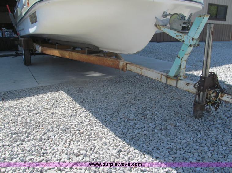 image for item B5131 1972 Anchor Plastics 614DVG 15 1/2' deck boat with Golden Rod trailer