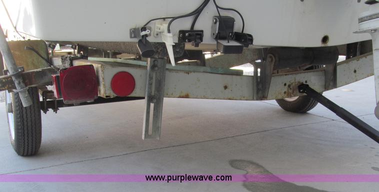 image for item B5131 1972 Anchor Plastics 614DVG 15 1/2' deck boat with Golden Rod trailer