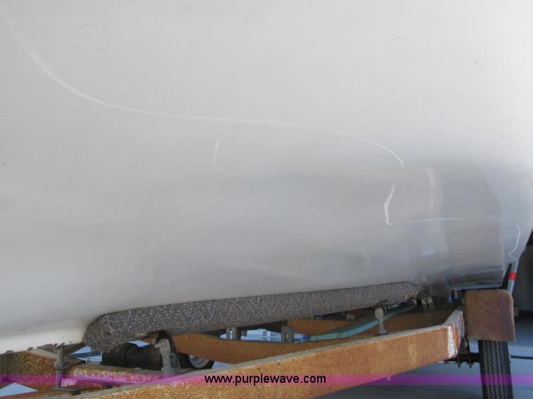 image for item B5131 1972 Anchor Plastics 614DVG 15 1/2' deck boat with Golden Rod trailer