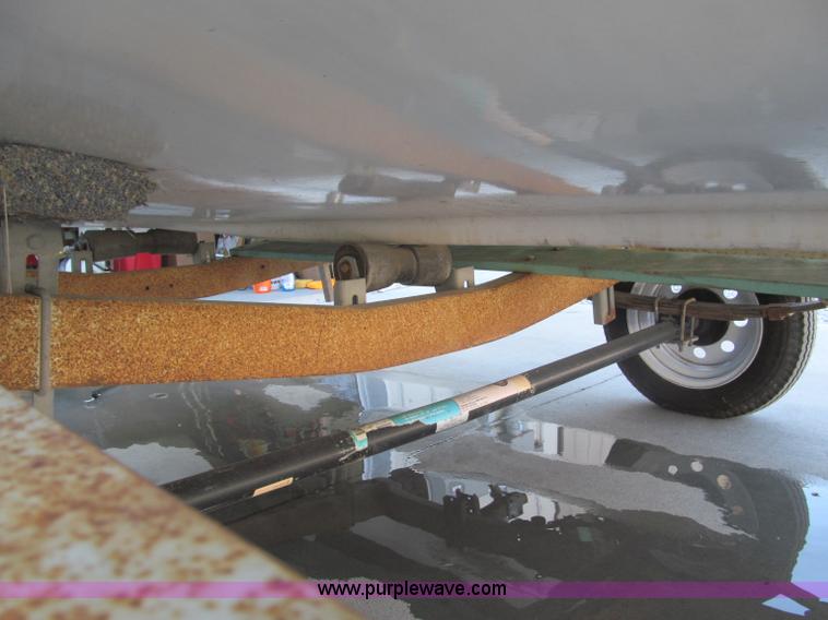 image for item B5131 1972 Anchor Plastics 614DVG 15 1/2' deck boat with Golden Rod trailer