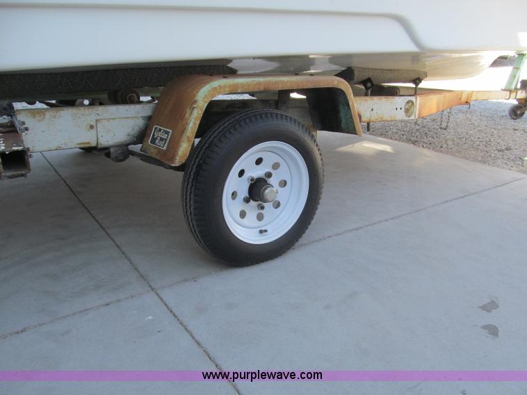 image for item B5131 1972 Anchor Plastics 614DVG 15 1/2' deck boat with Golden Rod trailer