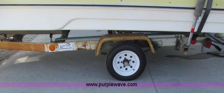 image for item B5131 1972 Anchor Plastics 614DVG 15 1/2' deck boat with Golden Rod trailer