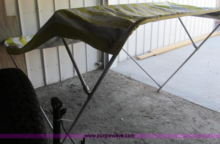 image for item B5131 1972 Anchor Plastics 614DVG 15 1/2' deck boat with Golden Rod trailer