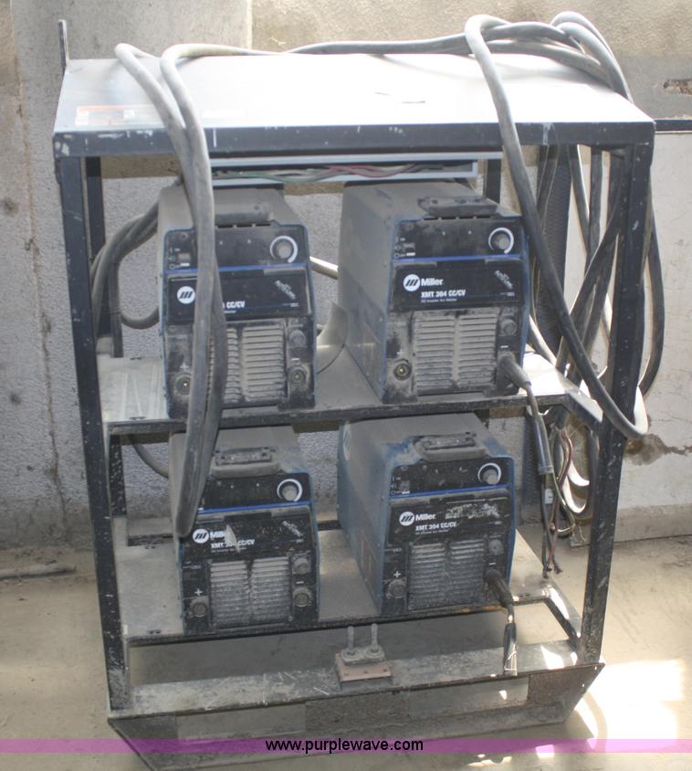 image for item B6554 Miller XMT304 CC/CV four pack welders with auto link