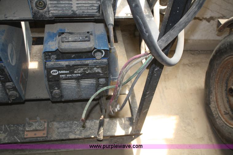 image for item B6554 Miller XMT304 CC/CV four pack welders with auto link