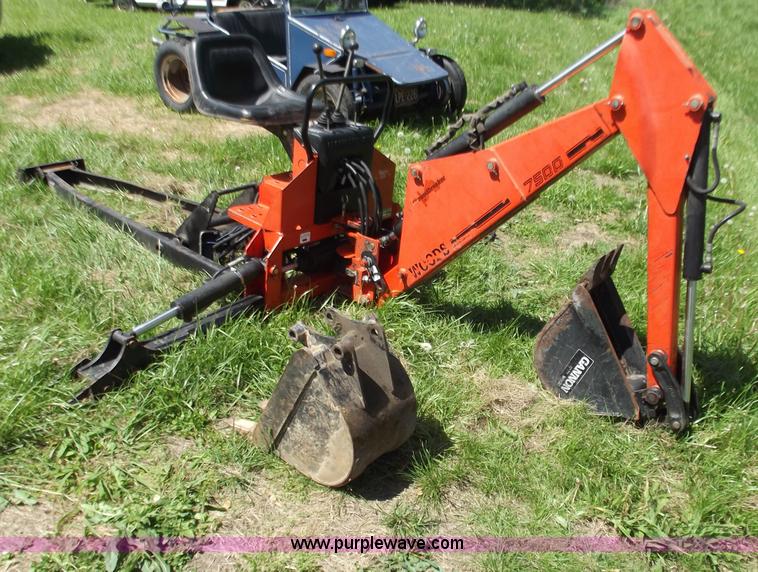 1997 7500 Woods backhoe attachment in Harrisonville, MO Item C2007