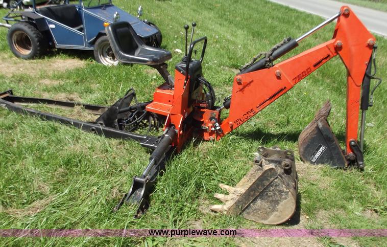 image for item C2007 1997 7500 Woods backhoe attachment