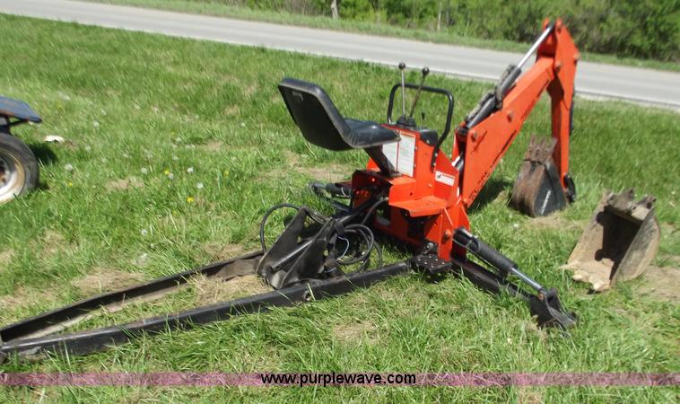 image for item C2007 1997 7500 Woods backhoe attachment