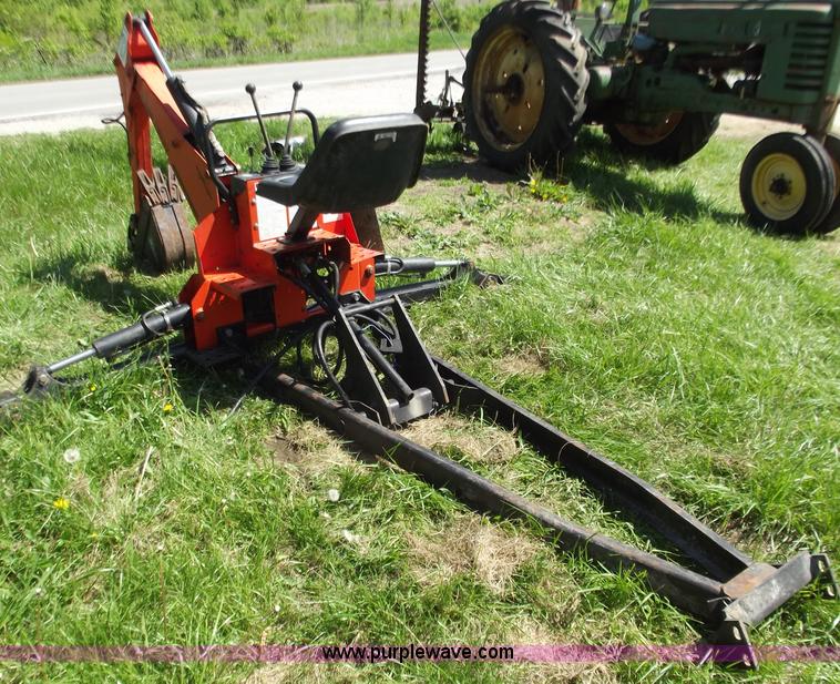 1997 7500 Woods backhoe attachment in Harrisonville, MO Item C2007