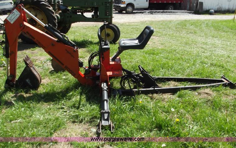 image for item C2007 1997 7500 Woods backhoe attachment