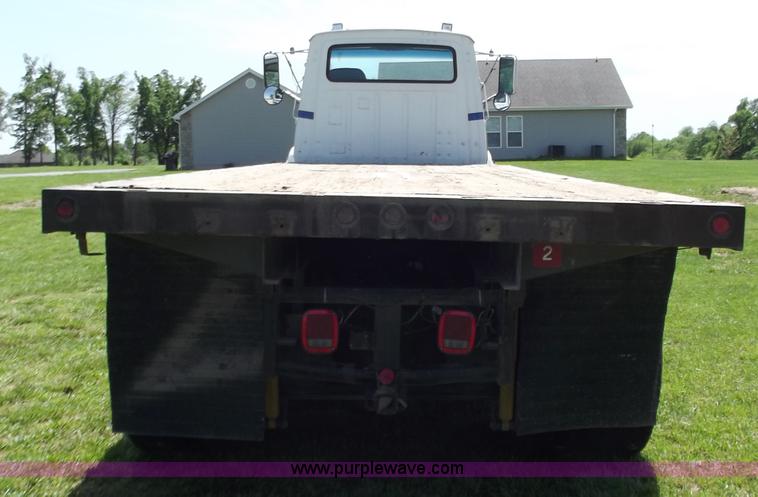 image for item C2024 1996 Ford LTA9000 AeroMax flatbed dump truck
