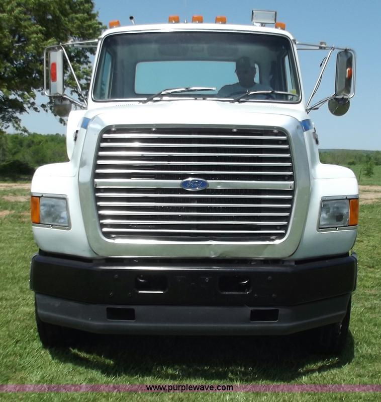 image for item C2024 1996 Ford LTA9000 AeroMax flatbed dump truck