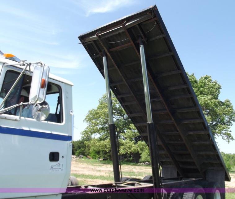 image for item C2024 1996 Ford LTA9000 AeroMax flatbed dump truck